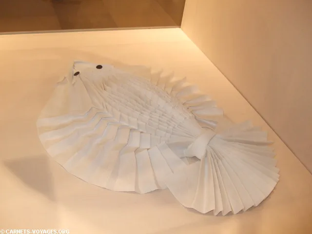 Pliage serviette en forme de poisson sole