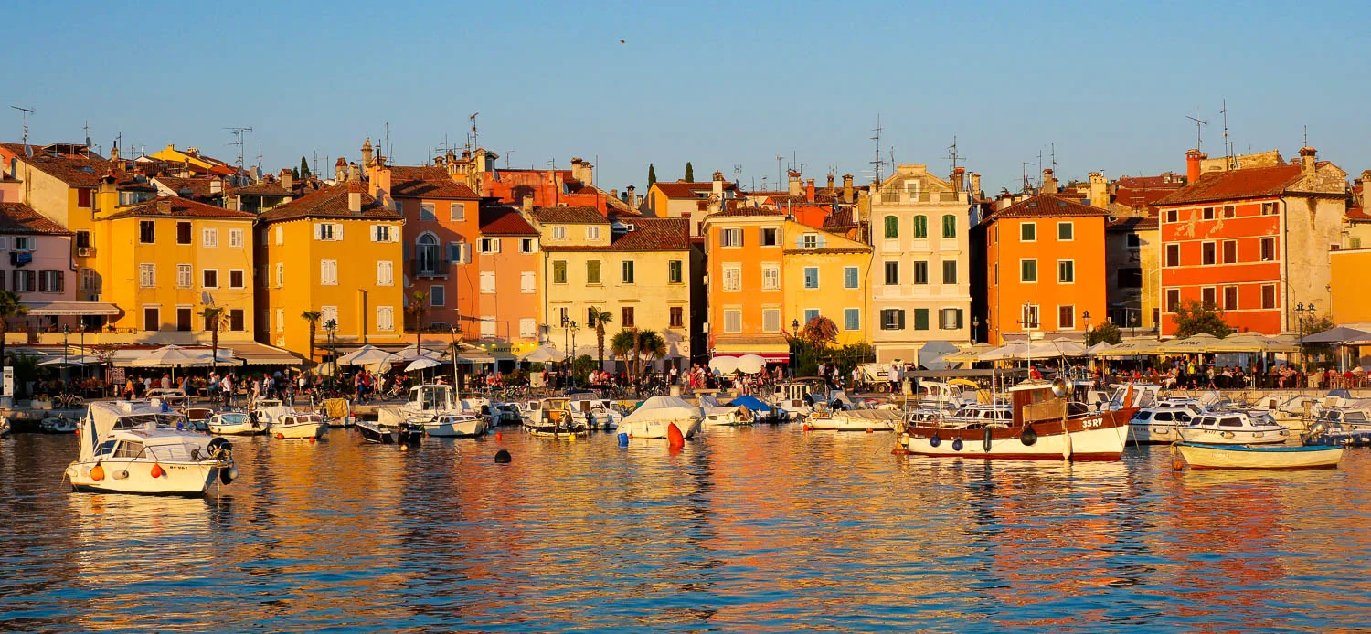 Sunset over the colorful facades of the port of Rovinj Croatia Istria