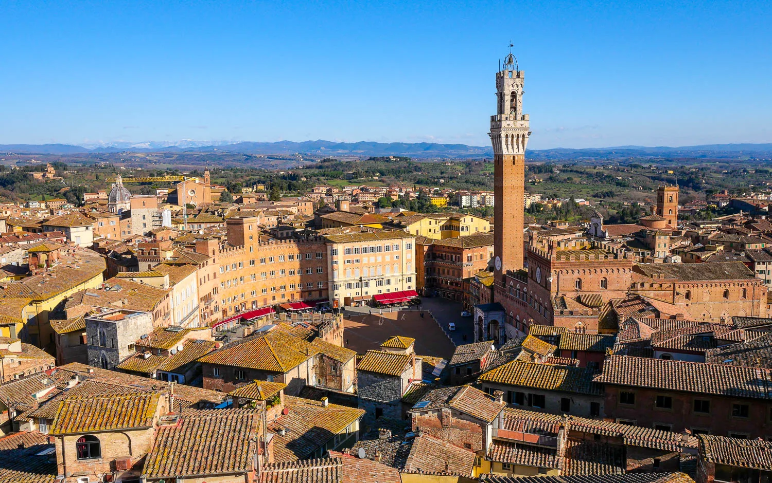 Visiting Siena panorama over Piazza del Campo from Facciatone