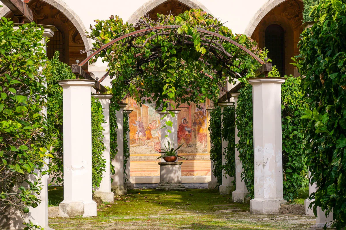 Monastery convent cloister majolica painted tiles Santa Chiara Naples Italy