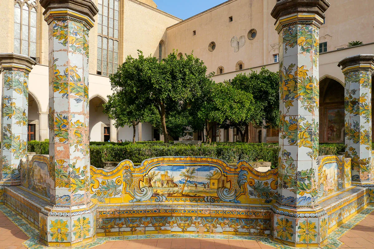 Monastery convent cloister majolica painted tiles Santa Chiara Naples Italy