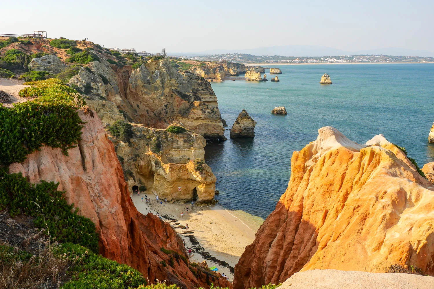 Lagos in Portugal Ponta da Piedade ochre cliffs beach visit the Algarve