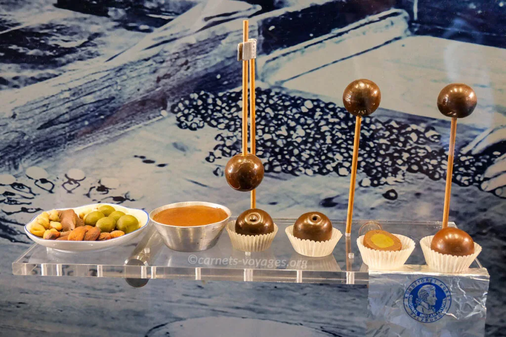 étapes fabrication boules de mozart chocolatier furst pistaches pate d'amande