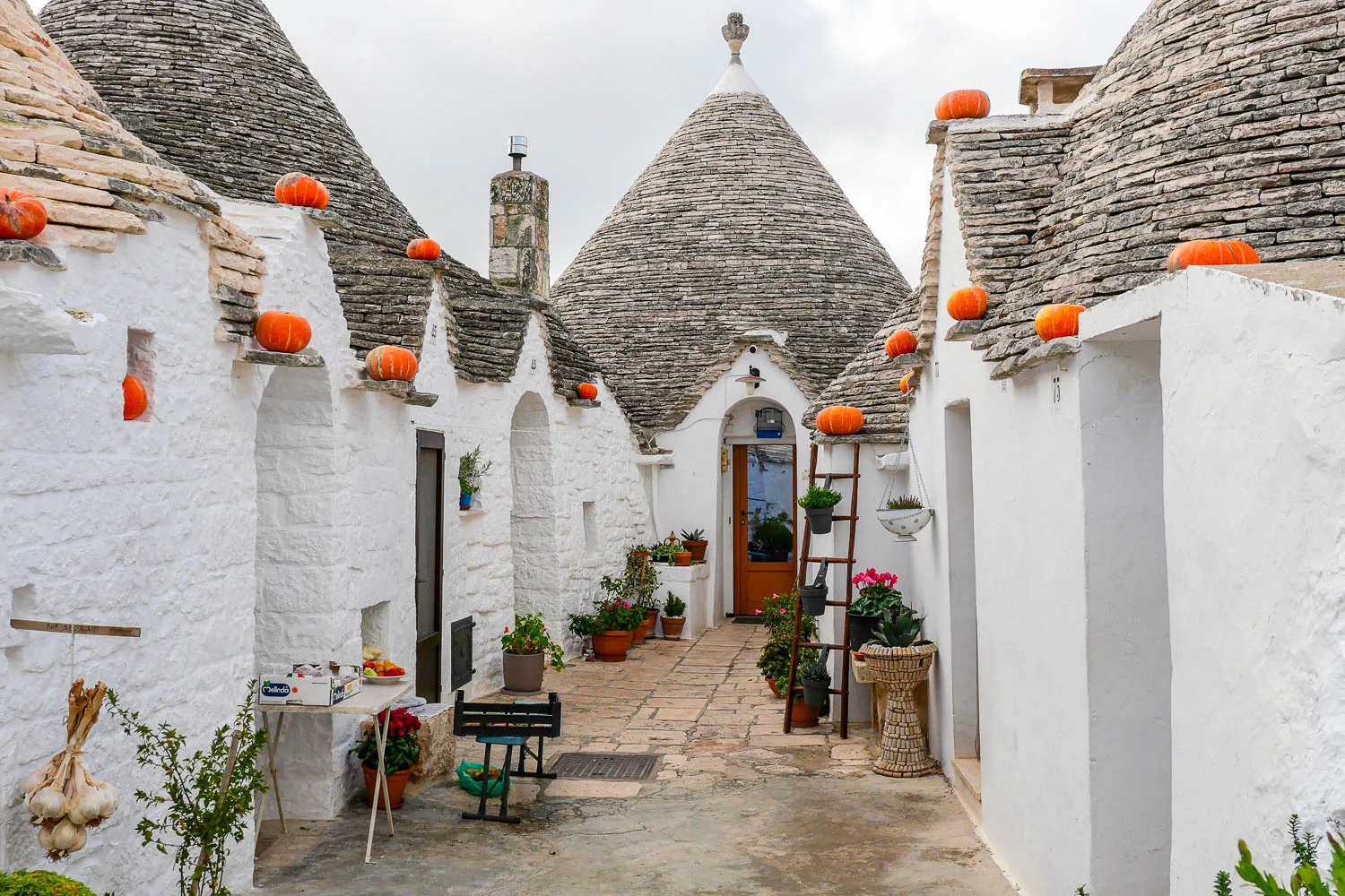 Alberobello Trulli of Rione Aia Piccola Puglia Italy pumpkins Halloween