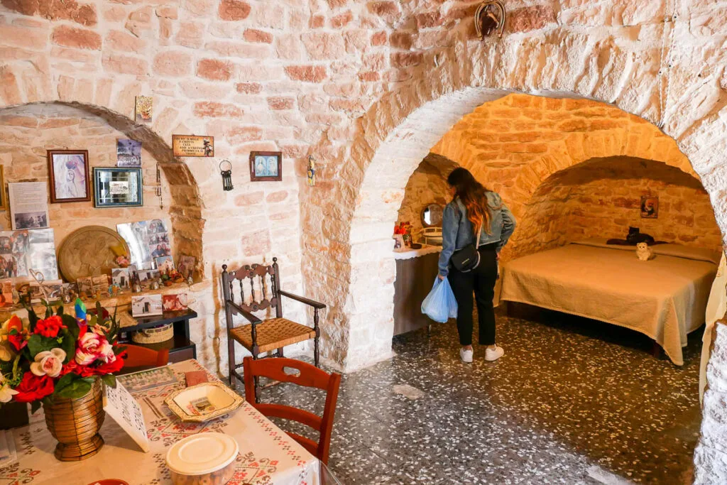 Visiting the inside of a trullo Alberobello Puglia Italy