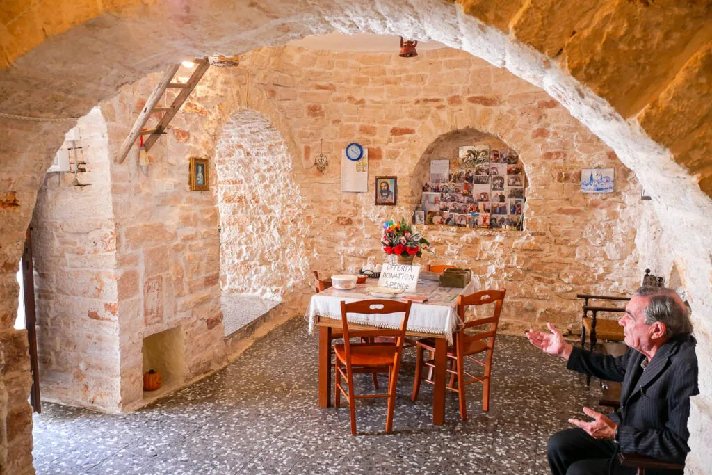 Visiting the inside of a trullo Alberobello Puglia Italy