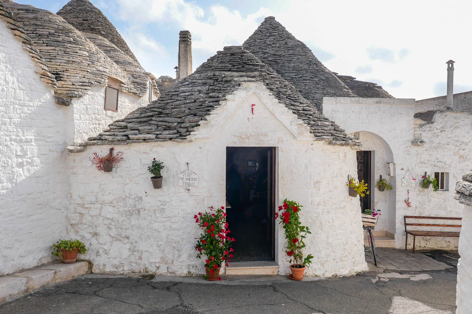 Visiting the inside of a trullo Alberobello Puglia Italy